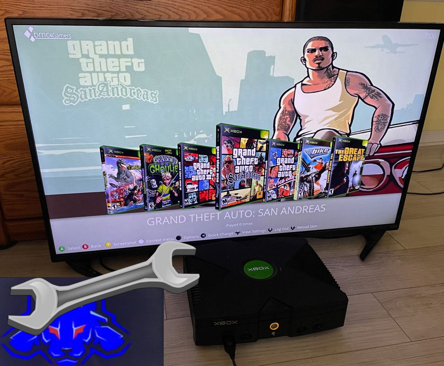 8TB CERBIOS modded OG Xbox showing XBMC4Gamers dashboard and internal 8TB drive with PATA to SATA adapter