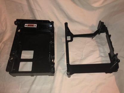 Original Xbox HDD and disc drive caddy housing two-piece OEM replacement with screw mounts alignment tabs and ventilation openings