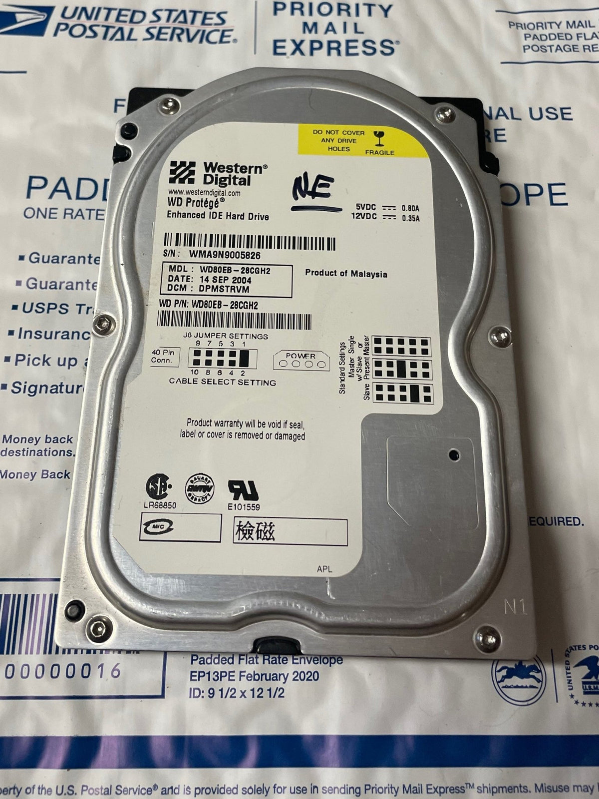 Western Digital WD80EB 8GB Xbox hard drive with factory-nulled EEPROM label and OEM connector