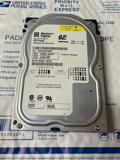 Western Digital WD80EB 8GB Xbox hard drive with factory-nulled EEPROM label and OEM connector