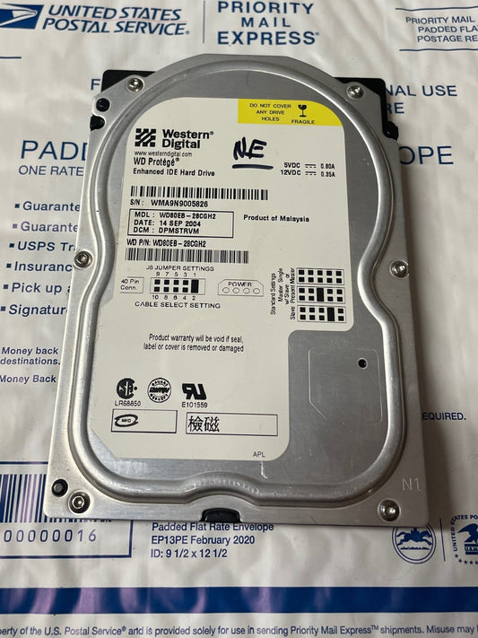 Western Digital WD80EB 8GB Xbox hard drive with factory-nulled EEPROM label and OEM connector